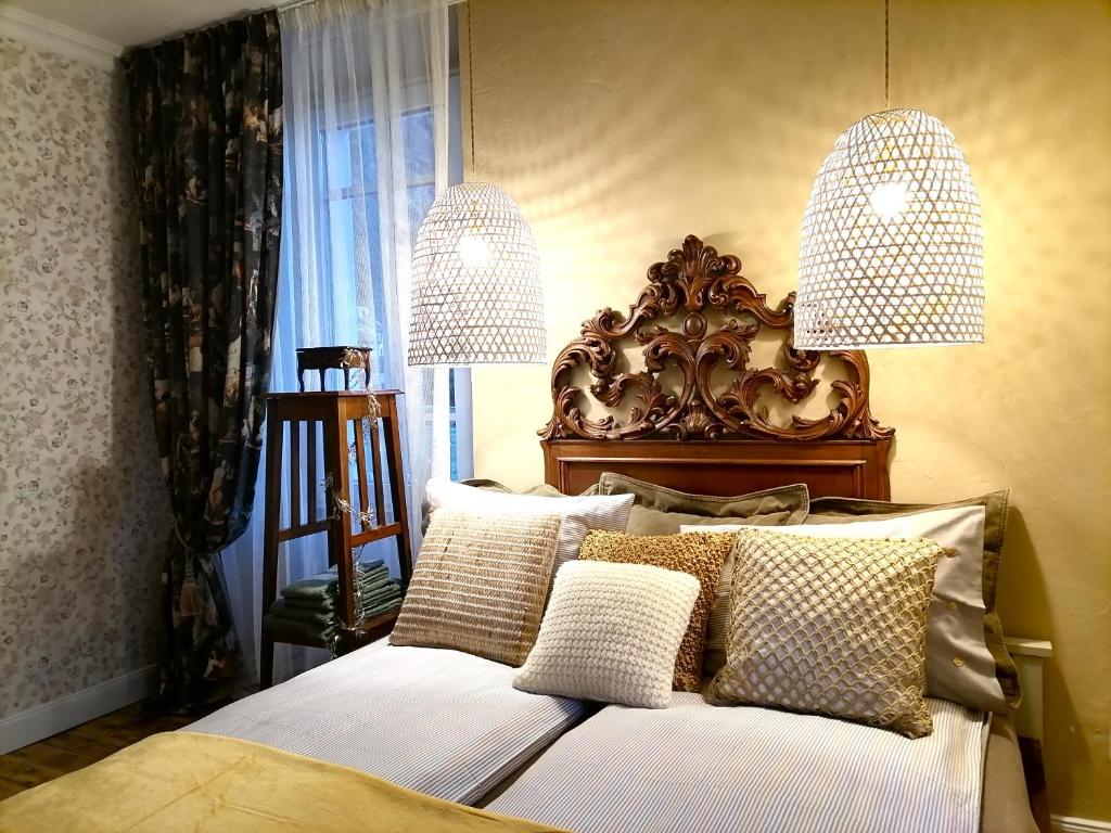 Postel nebo postele na pokoji v ubytování CASA BELGERI - Bed & Breakfast