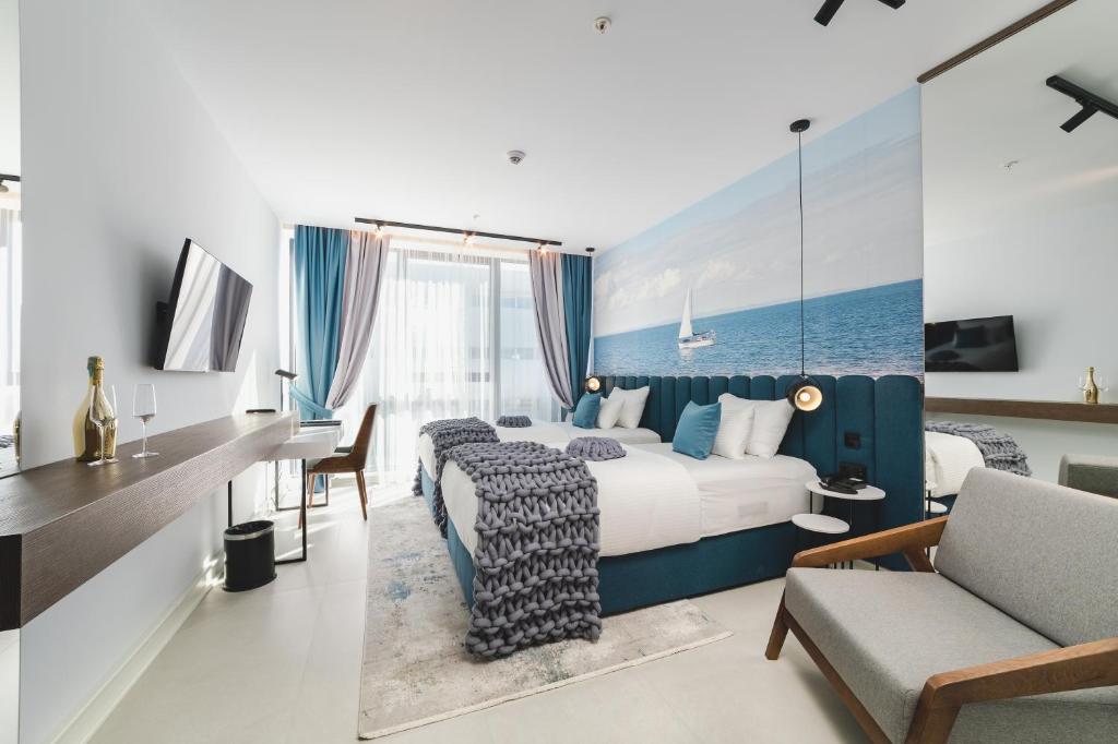 TV a/nebo společenská místnost v ubytování Hotel Aurel Coast
