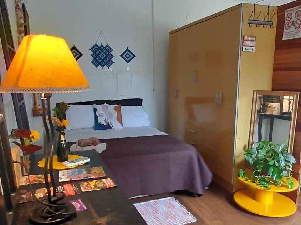 Villacasamarela mini casinhas de hospedes Rio vermelhoにあるベッド