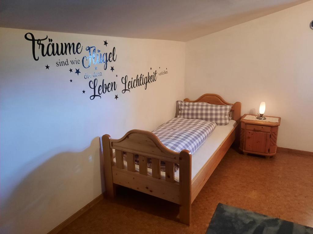 Postel nebo postele na pokoji v ubytování Appartements Anfang