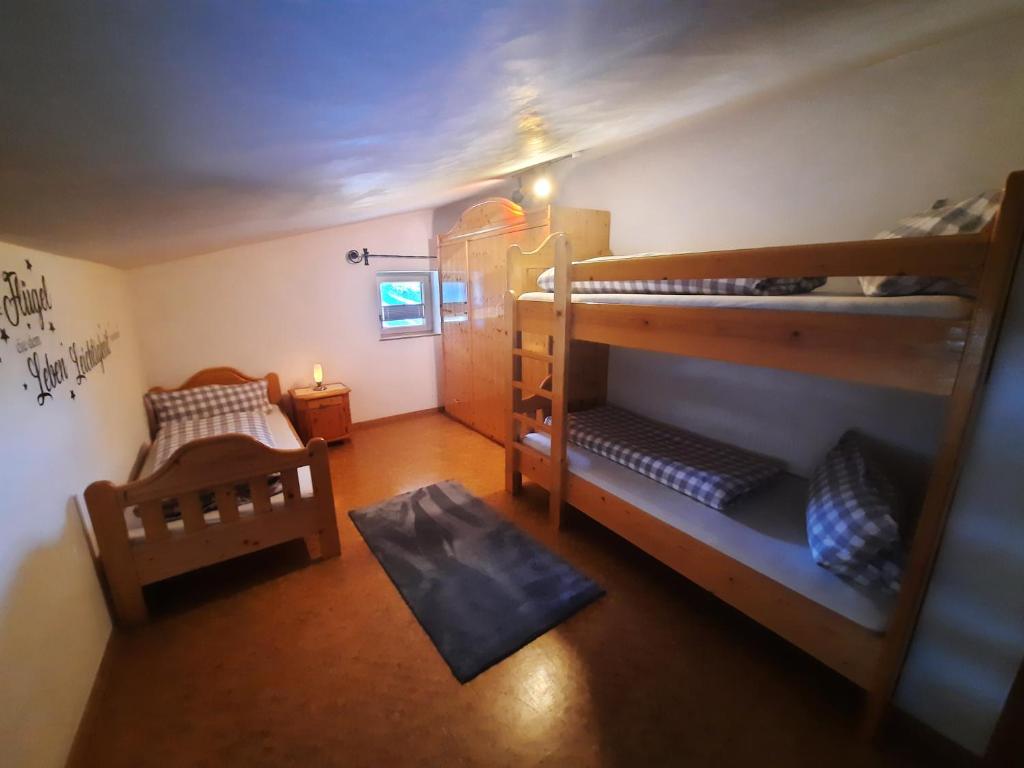 Postel nebo postele na pokoji v ubytování Appartements Anfang