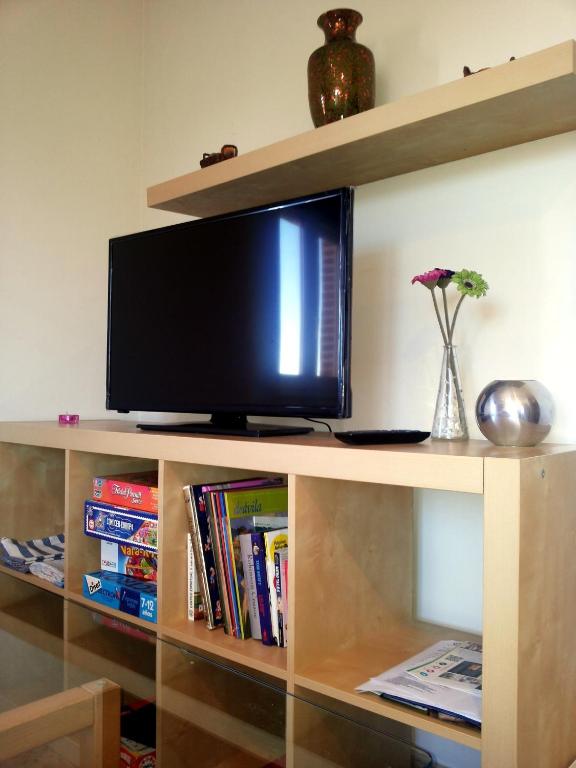 TV a/nebo společenská místnost v ubytování VuT Los Telares Muralla