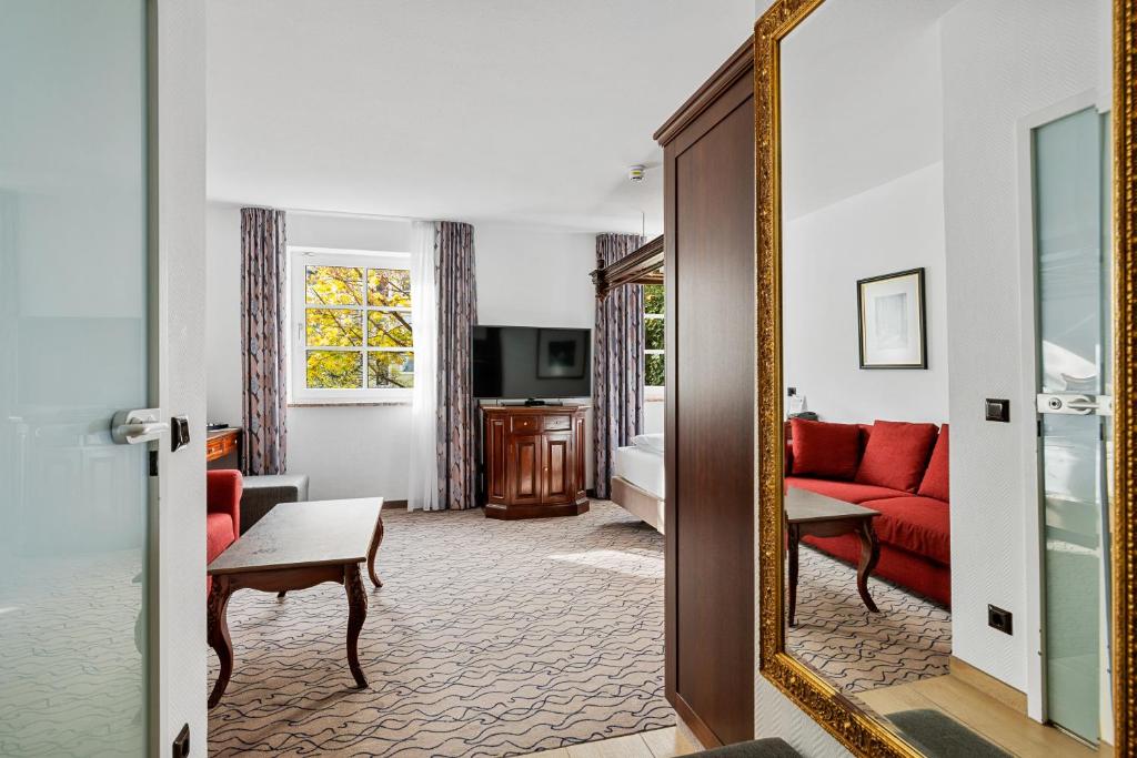 TV a/nebo společenská místnost v ubytování King's Hotel Center Superior