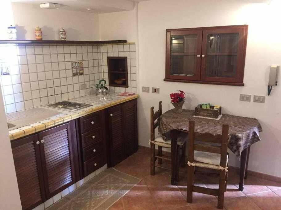 A kitchen or kitchenette at Il Convento Alghero