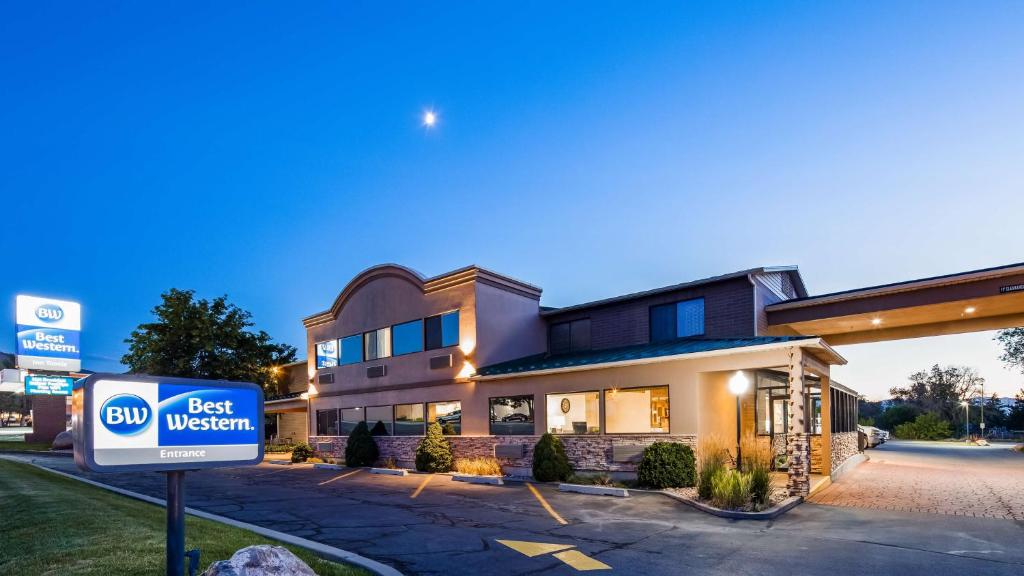 a best western building with a sign in front of it at Best Western Inn Tooele in Tooele