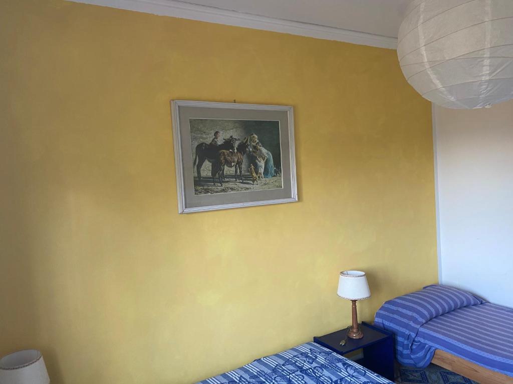 Łóżko lub łóżka w pokoju w obiekcie Villa Marie Claire