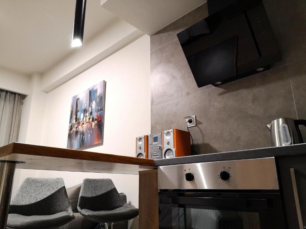 Kuchyň nebo kuchyňský kout v ubytování Insomnia studio Komotini