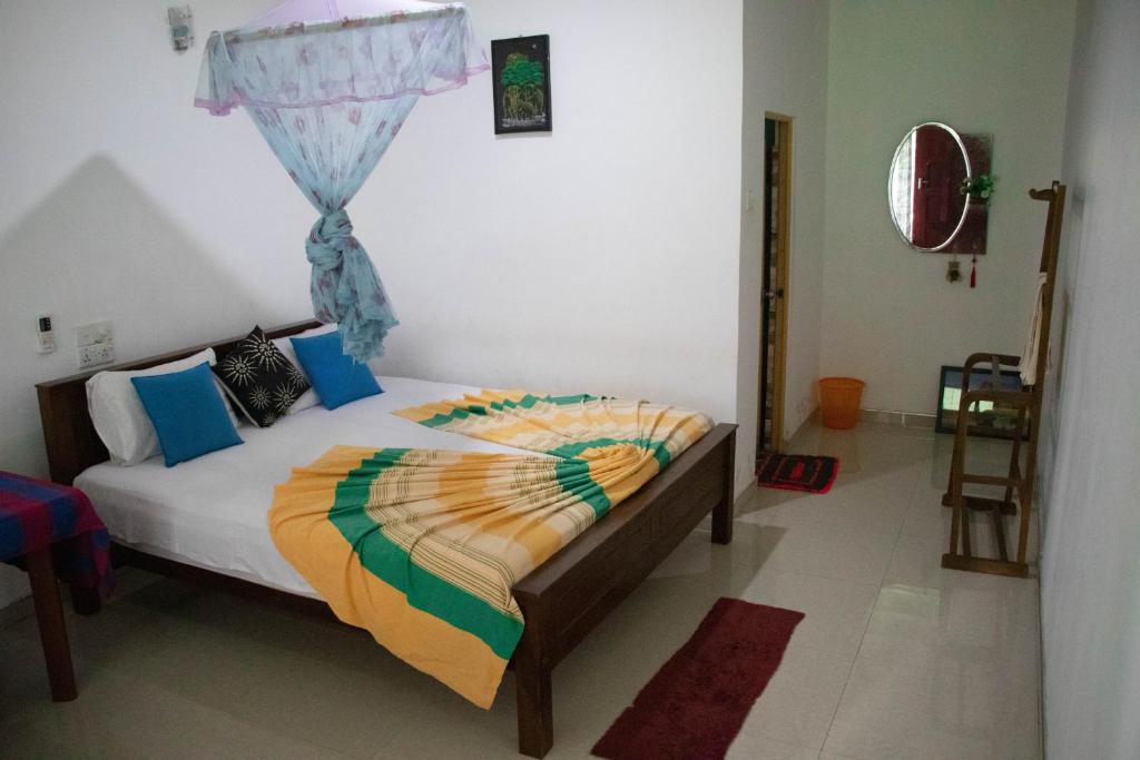 Postel nebo postele na pokoji v ubytování Freedom Home Stay