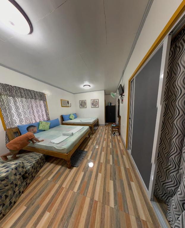 TV a/nebo společenská místnost v ubytování Domos Native Guest House