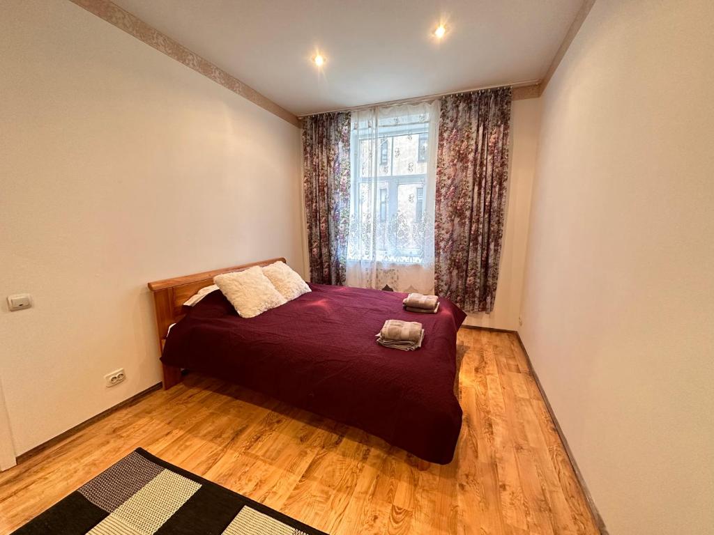 Posteľ alebo postele v izbe v ubytovaní Bruninieku Street Apartment 41