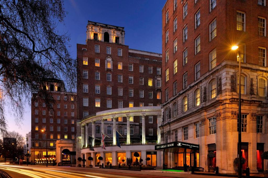 a building on a city street with a building at JW Marriott Grosvenor House London in London