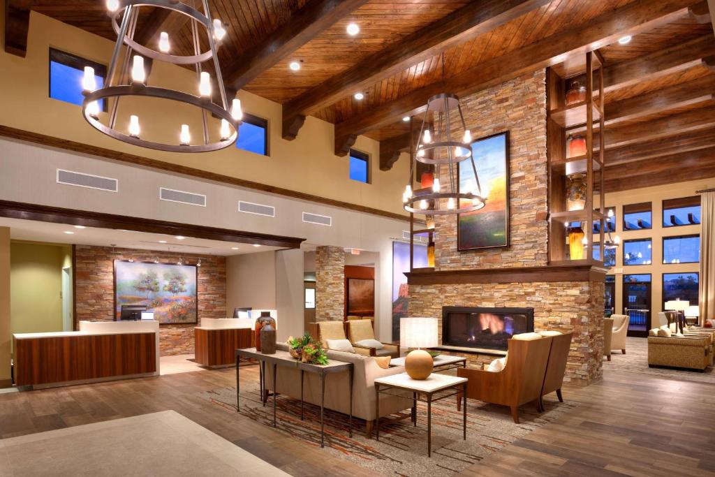 a lobby of a hotel with a fireplace at Courtyard by Marriott Sedona in Sedona