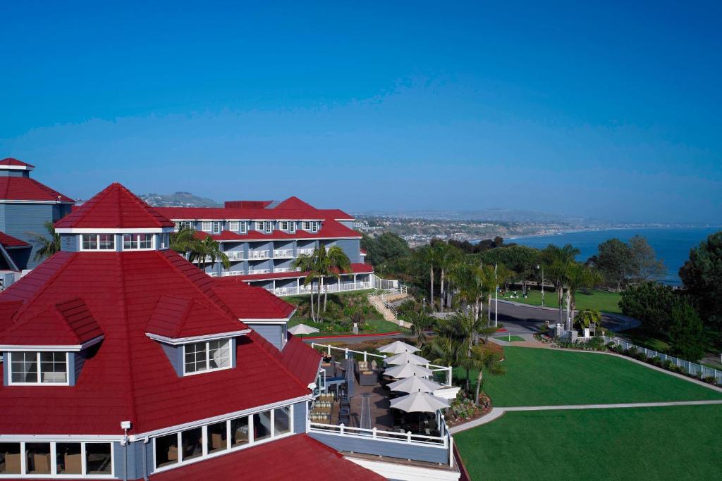 an aerial view of a hotel with a red roof at Laguna Cliffs Marriott Resort & Spa in Dana Point