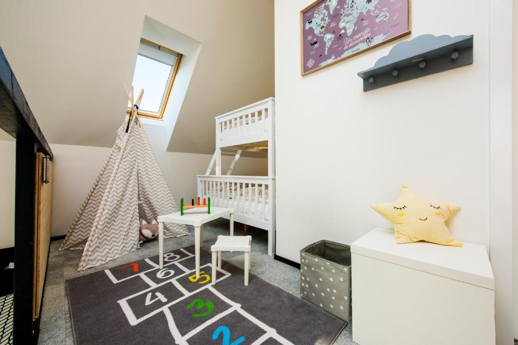 Postel nebo postele na pokoji v ubytování Demänová Rezort