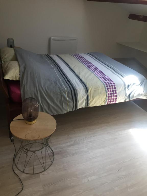 Łóżko lub łóżka w pokoju w obiekcie Villa Emma 10 / 12 personnes