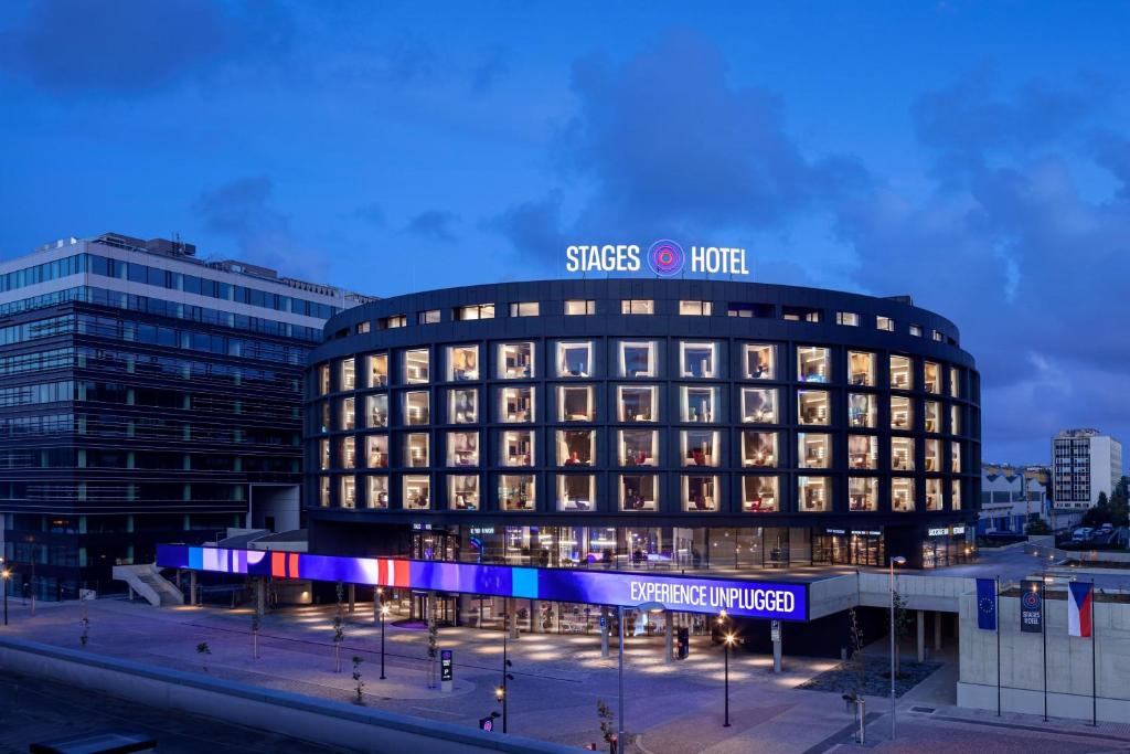 a building with a sign on the side of it at STAGES HOTEL Prague, a Tribute Portfolio Hotel in Prague
