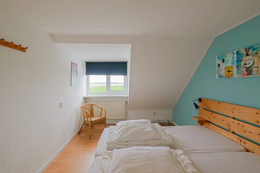 Postel nebo postele na pokoji v ubytování Vakantiehuis Hoeve Zuid - Groote Keeten aan Zee