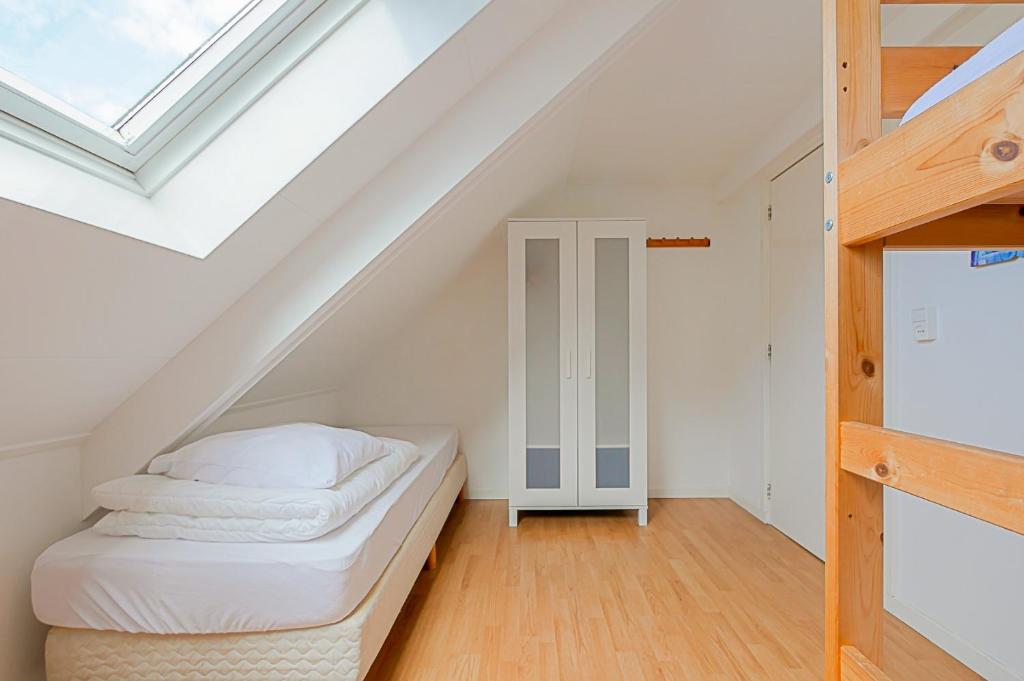 Postel nebo postele na pokoji v ubytování Vakantiehuis Hoeve Zuid - Groote Keeten aan Zee