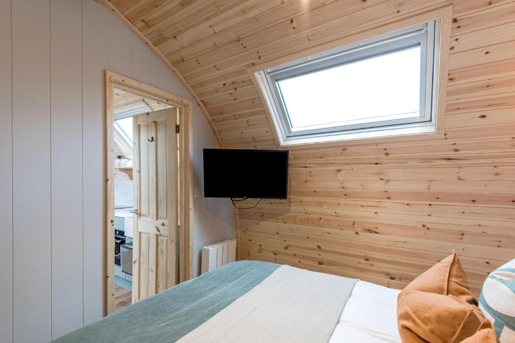 TV a/nebo společenská místnost v ubytování Country Glamping