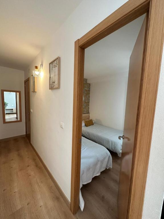 Postel nebo postele na pokoji v ubytování Apartamento Marval PLAYA DE LEVANTE