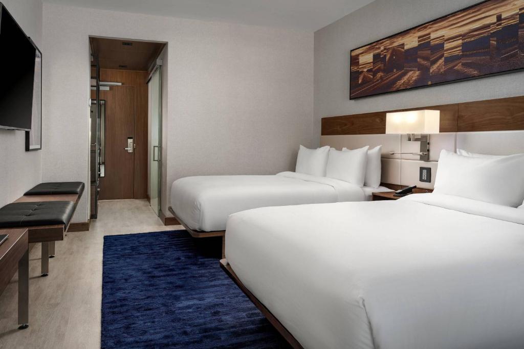 Postel nebo postele na pokoji v ubytování AC Hotel by Marriott Austin-University