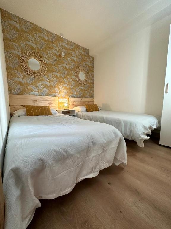Postel nebo postele na pokoji v ubytování Apartamento Marval PLAYA DE LEVANTE