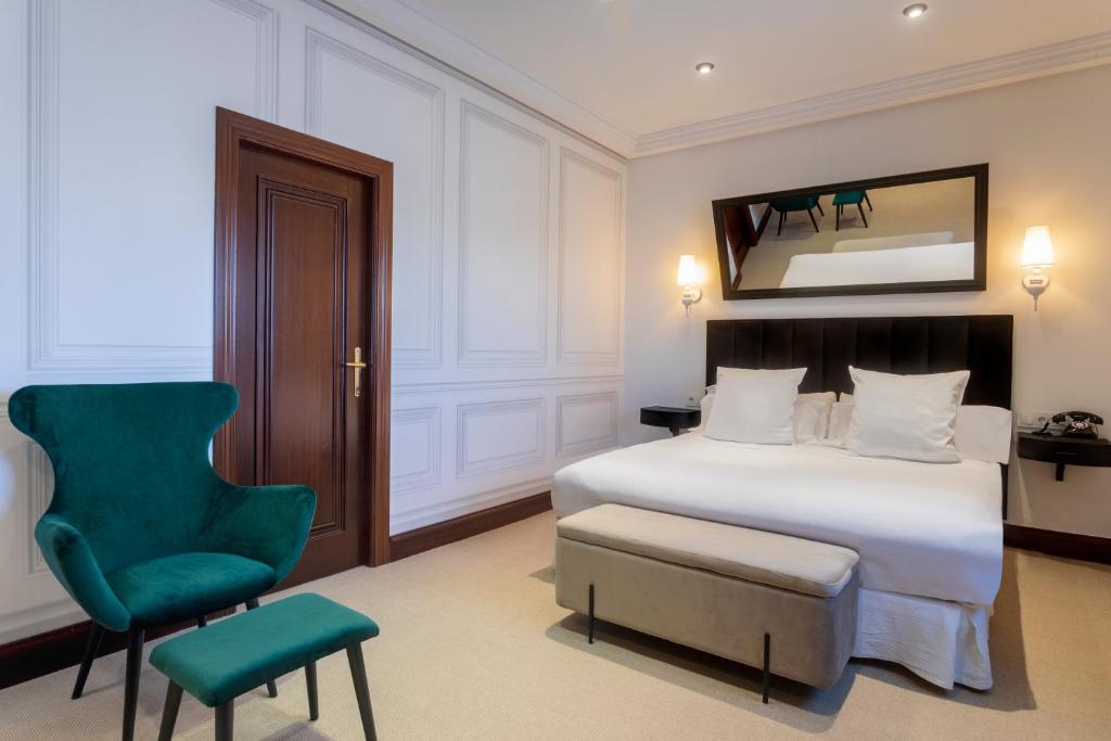 Postel nebo postele na pokoji v ubytování Hotel & Spa Arzuaga