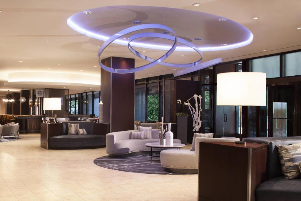 a large lobby with a large blue ceiling at Dallas Marriott Downtown in Dallas