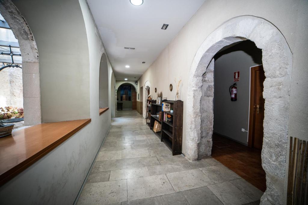 TV a/nebo společenská místnost v ubytování Albergue de Cuéllar