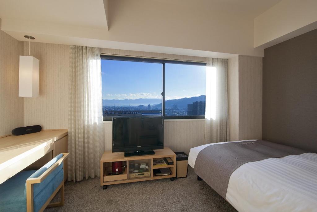 TV a/nebo společenská místnost v ubytování Cocochee Hotel Numazu