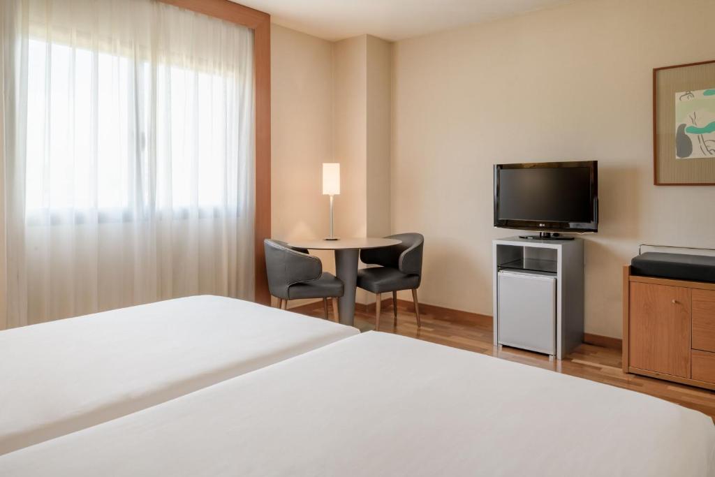 TV a/nebo společenská místnost v ubytování AC Hotel Murcia by Marriott