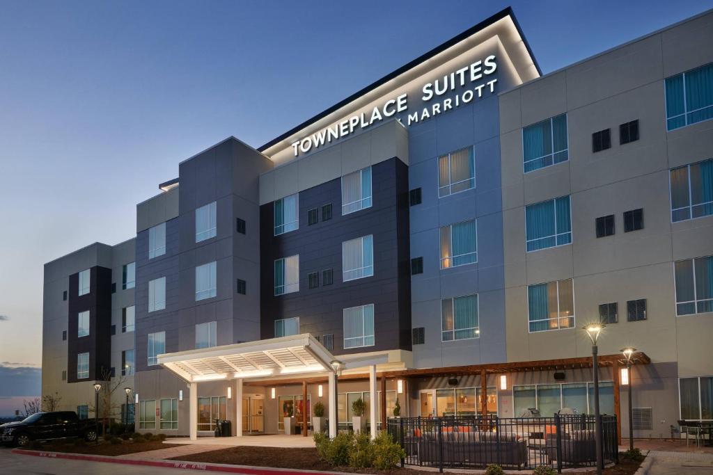 a rendering of the front of a hotel at TownePlace Suites Fort Worth Northwest Lake Worth in Fort Worth