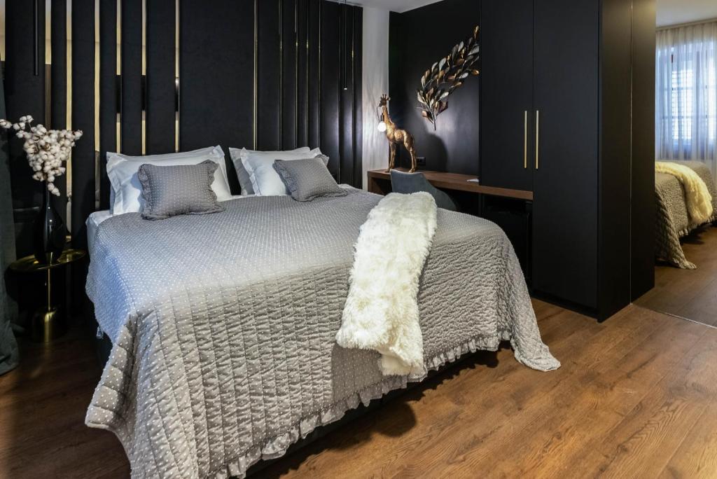 Łóżko lub łóżka w pokoju w obiekcie City Premium Rooms Old town