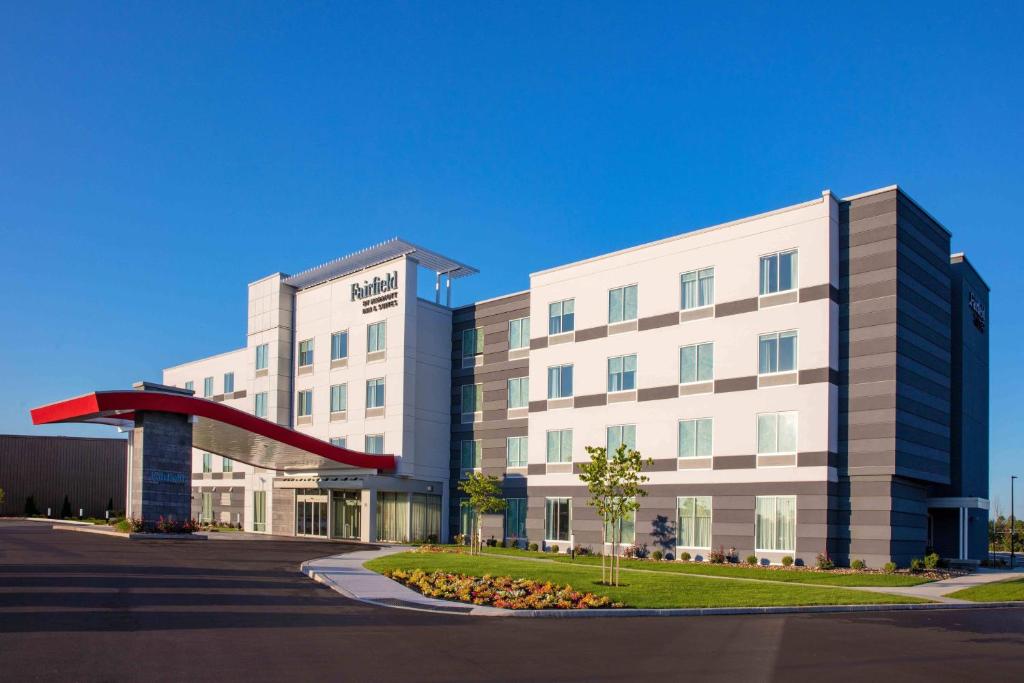 a rendering of a hotel with a large building at Fairfield by Marriott Inn & Suites Lewisburg in Lewisburg
