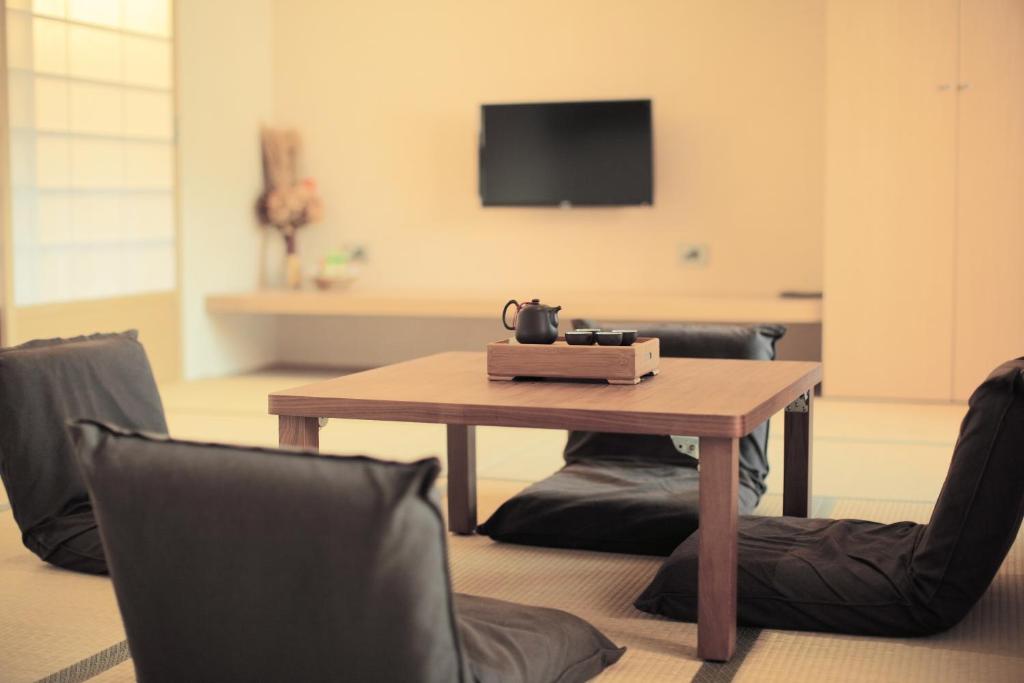TV a/nebo společenská místnost v ubytování Mellow Fields Hotel
