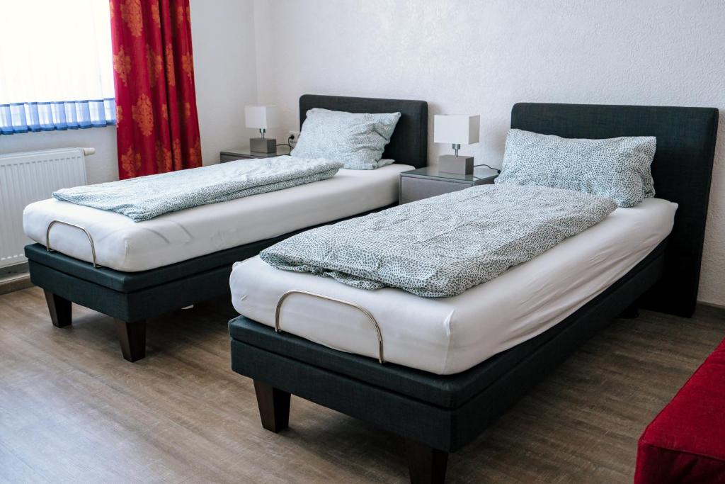Postel nebo postele na pokoji v ubytování Dill Hotel