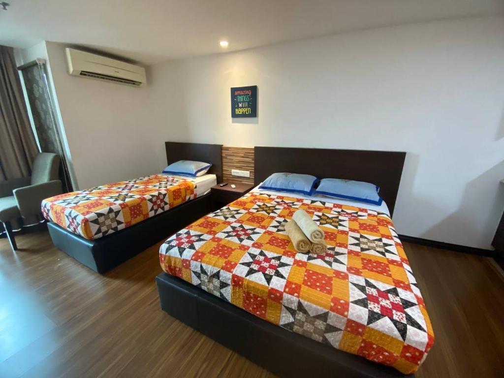 Postel nebo postele na pokoji v ubytování Cyber Studio Apartment