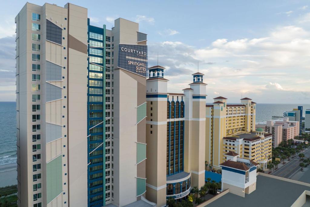 an aerial view of a city with buildings at SpringHill Suites by Marriott Myrtle Beach Oceanfront in Myrtle Beach