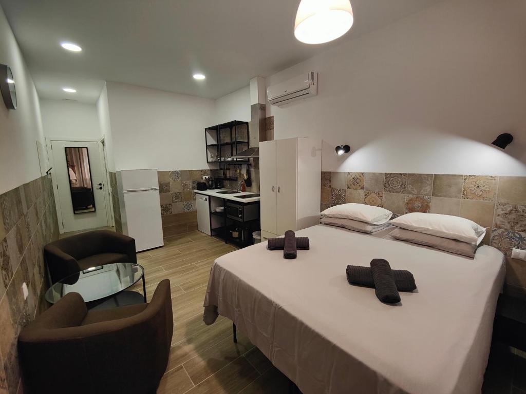 Postel nebo postele na pokoji v ubytování Apartamentos Pueblo Mar