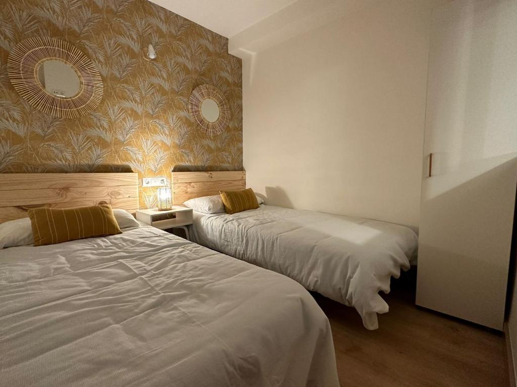 Postel nebo postele na pokoji v ubytování Apartamento Marval PLAYA DE LEVANTE