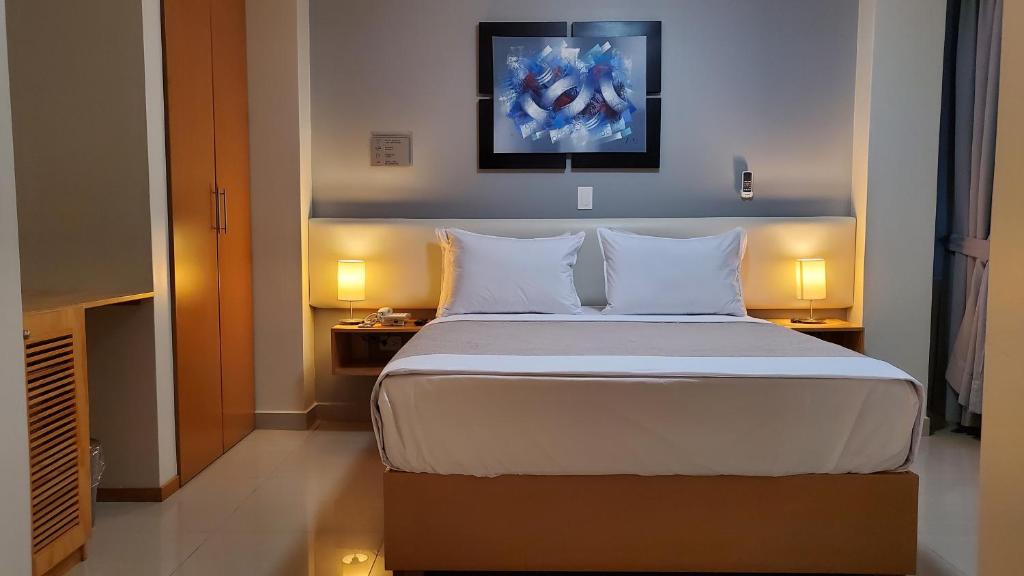 Postel nebo postele na pokoji v ubytování Hotel Punta Rocas - Huacho