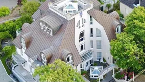 an overhead view of a large white house at Villa Ney in Norderney