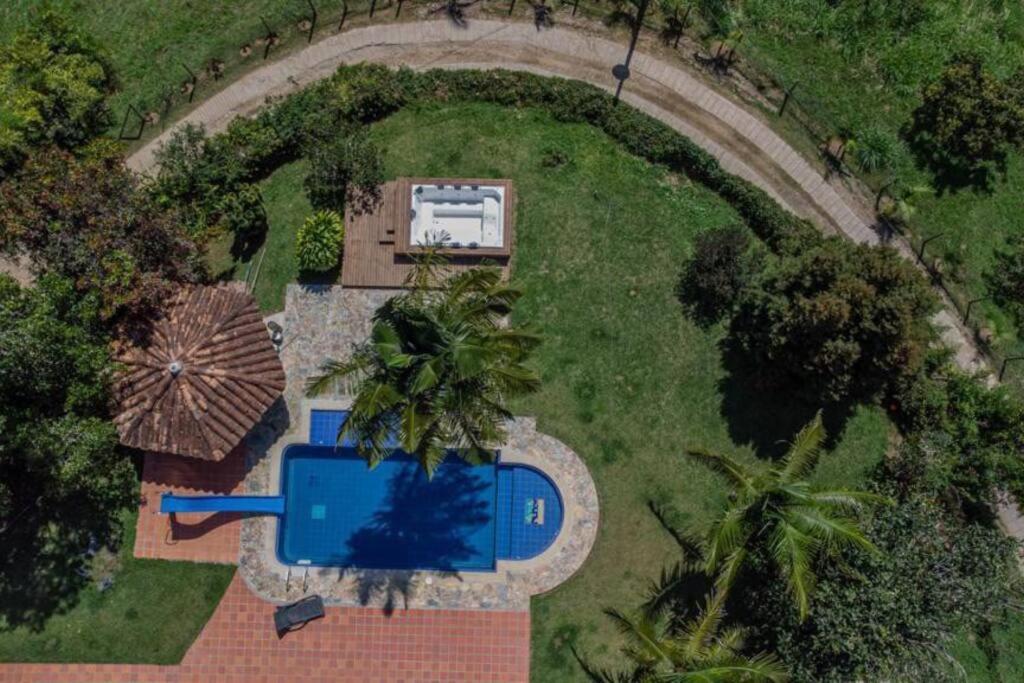 Bazén v ubytování Finca El paraíso Guatape nebo v jeho okolí