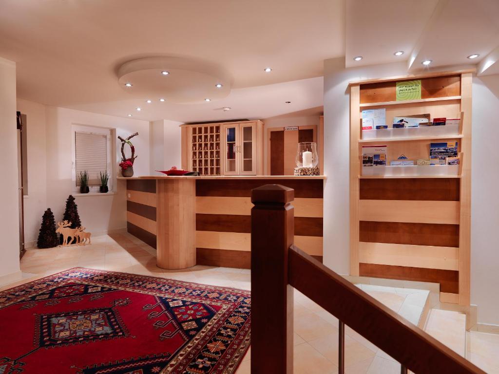 Postel nebo postele na pokoji v ubytování Posthotel Strengen am Arlberg