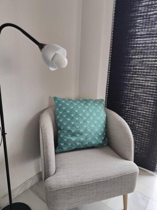 A seating area at Benalmádena Apartment 66m2 terrace 16m2 sea view 200m from the beach