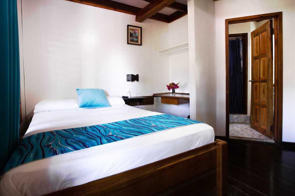 Postel nebo postele na pokoji v ubytování Mango Inn Resort