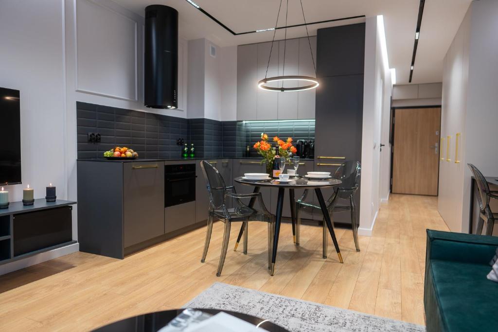 Kuchyň nebo kuchyňský kout v ubytování Manufaktura Modern Classic Apartment