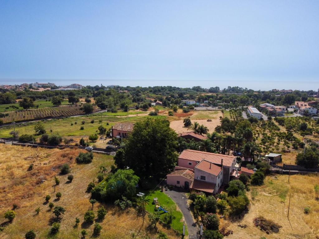 an aerial view of a house in a field at Villa Nadira in Giardini Naxos