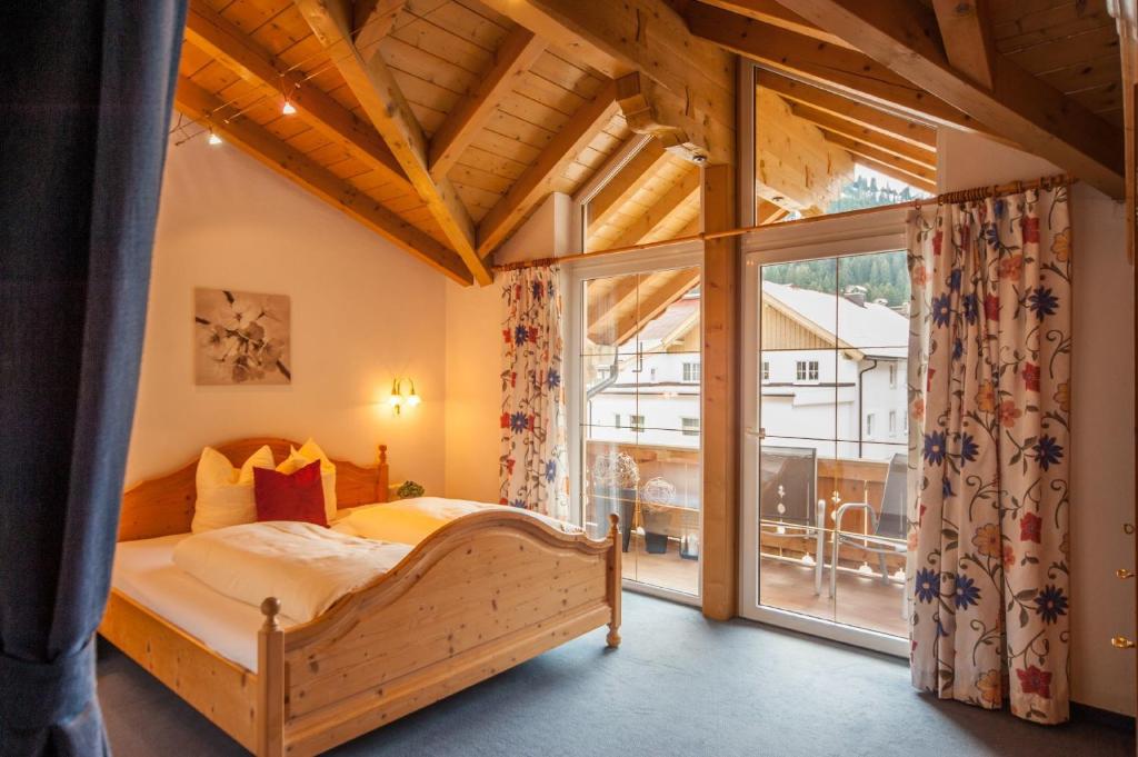 Postel nebo postele na pokoji v ubytování Ferienanlage Hechenbergerhof