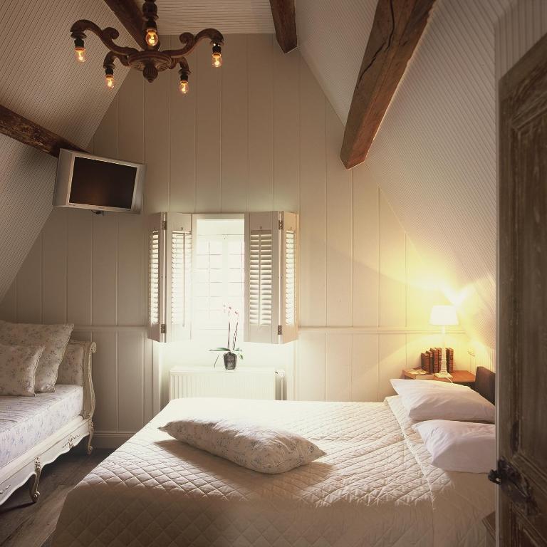 Postel nebo postele na pokoji v ubytování Relais Bourgondisch Cruyce, A Luxe Worldwide Hotel